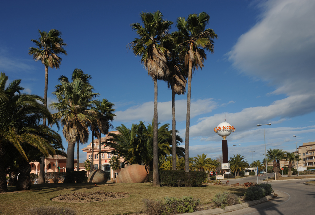 Palm trees and entrance to Oliva Nova, near Oliva in Valencia