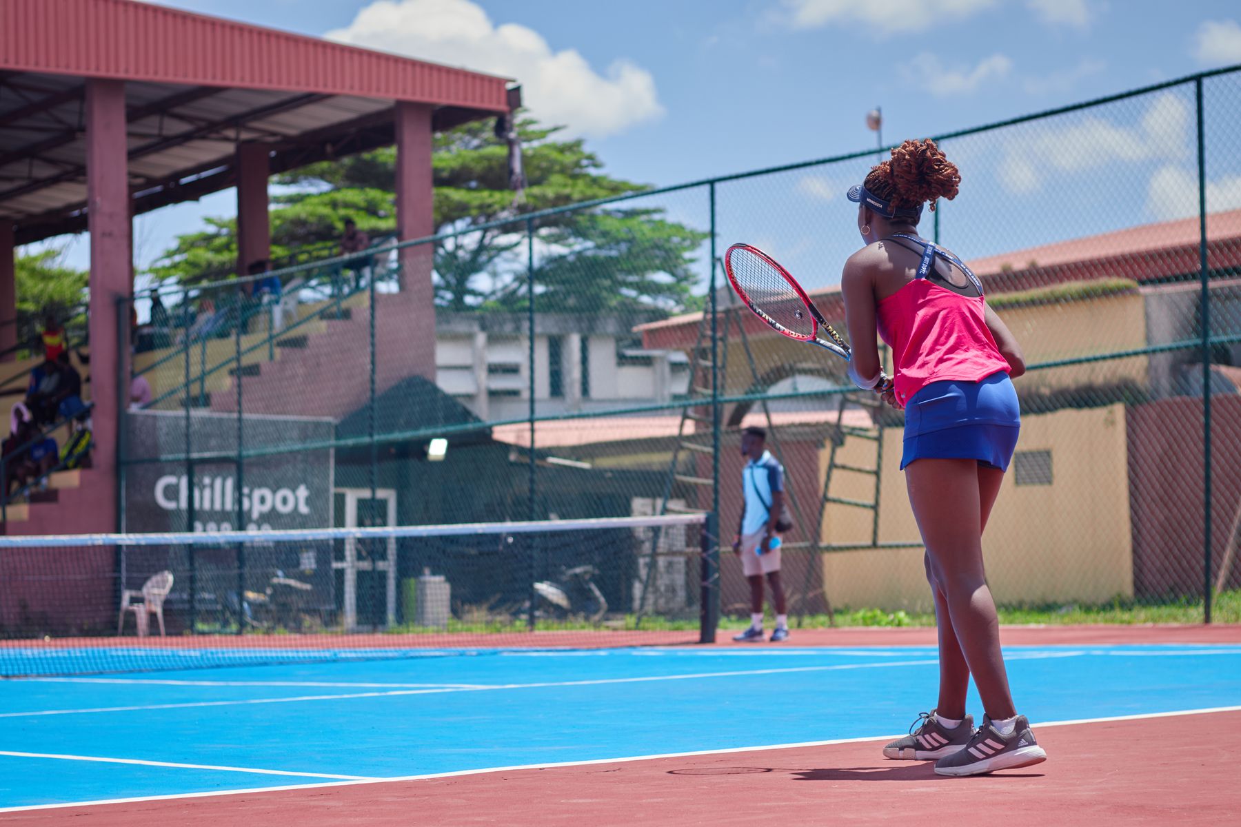 Tennis players at an outdoor court, illustrative sport photography